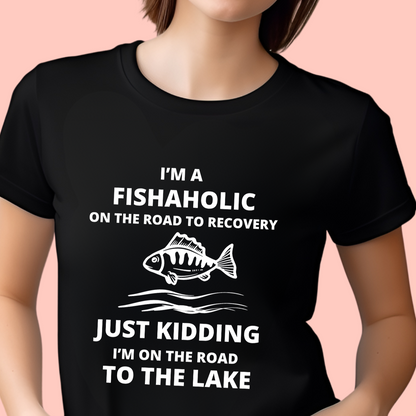 "I’m a fishaholic on the road to recovery. Just kidding I’m on the road to the lake" Unisex Cotton Tee