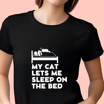 "My cat lets me sleep on the bed" Unisex Cotton Tee