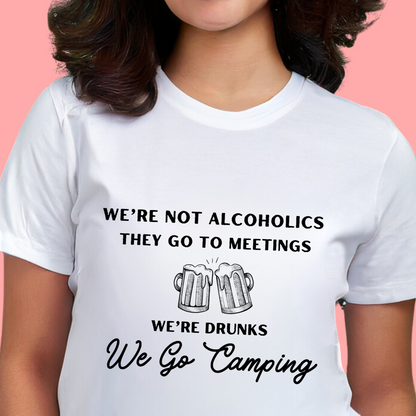 'We're not alcoholics they go to meetings we're drunks we go camping" Unisex Cotton Tee