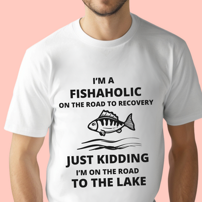 "I’m a fishaholic on the road to recovery. Just kidding I’m on the road to the lake" Unisex Cotton Tee