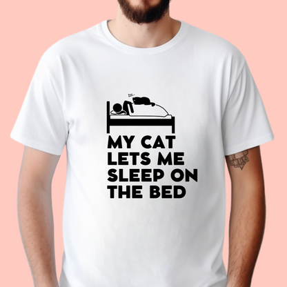 "My cat lets me sleep on the bed" Unisex Cotton Tee